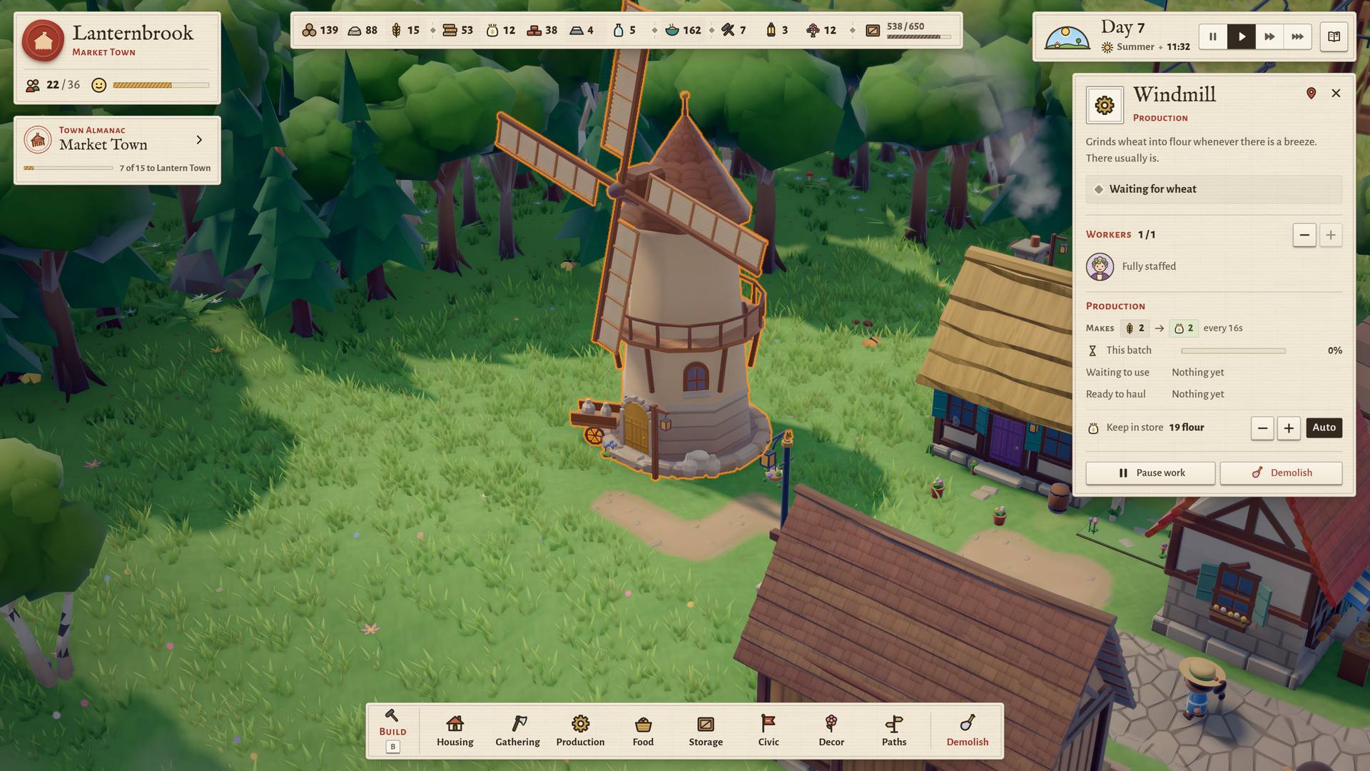 The game with the windmill’s inspector panel open, showing it fully staffed and waiting for wheat to arrive.